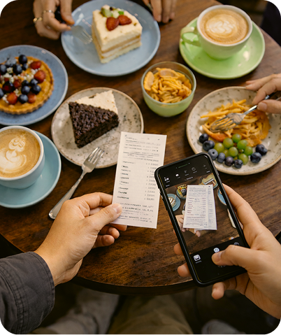 Food on a table with a phone and a receipt