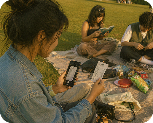 A person scanning a receipt with Kipkip while spending time outdoors